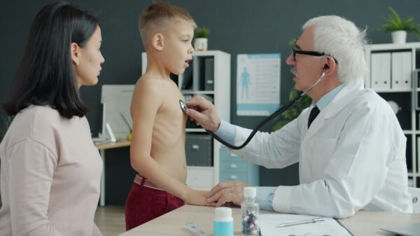 Doctor examining a child, illustrative image